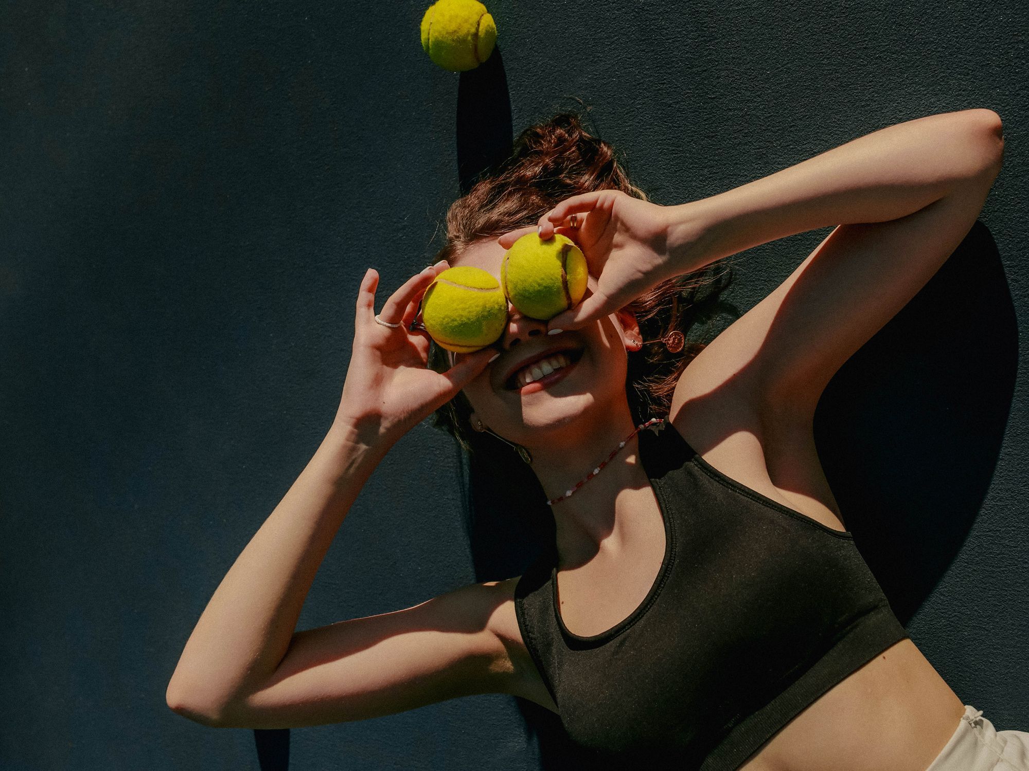 Athlete experiencing the power of gym scent marketing during her workout.