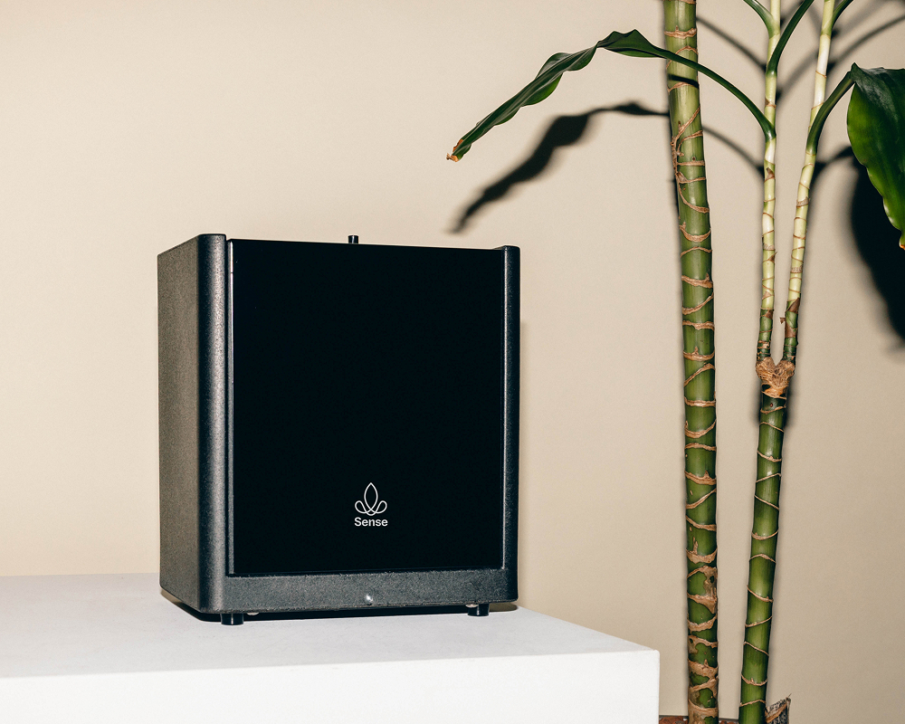 Minimalist black scent diffuser blending into interior design